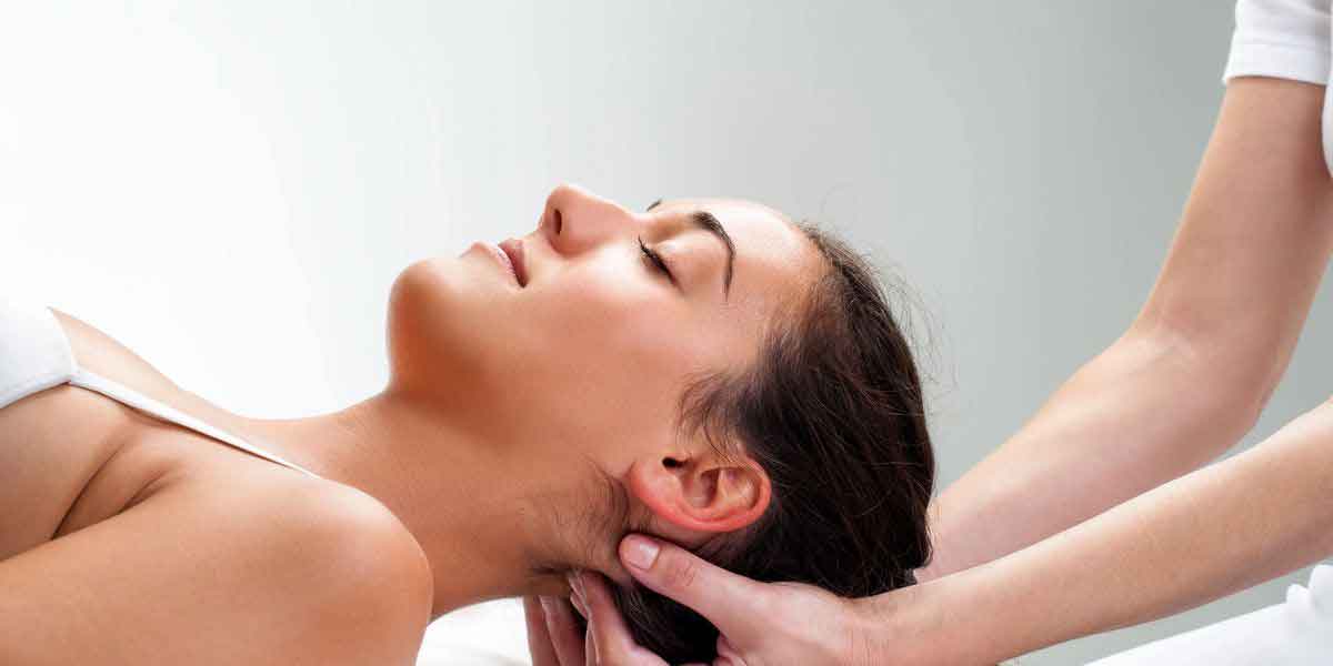 Woman receiving a neck massage